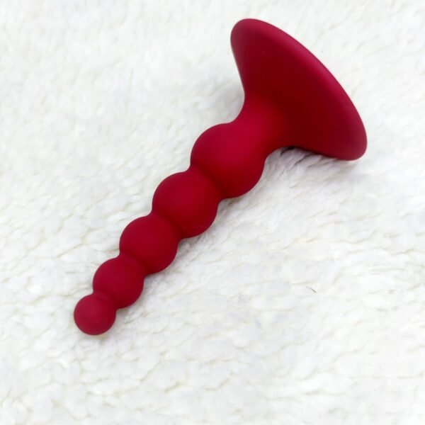 Анальна пробка на силіконову присоску Loveshop RED